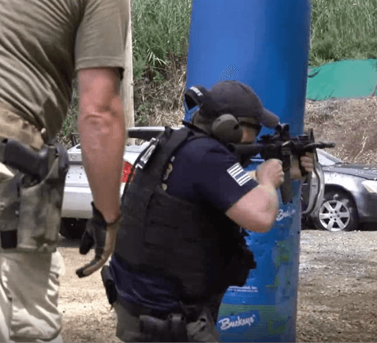 man in uniform during a shooting practice